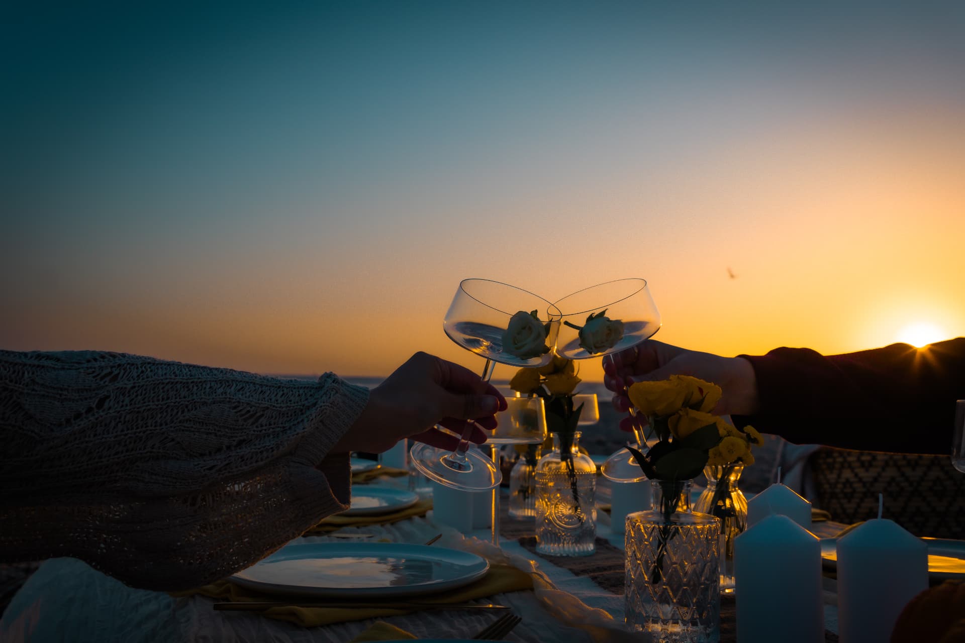 Candlelit picnic at sunset